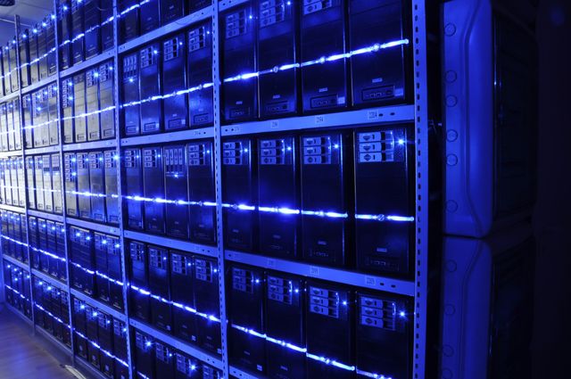 Rows of server racks inside a data centre